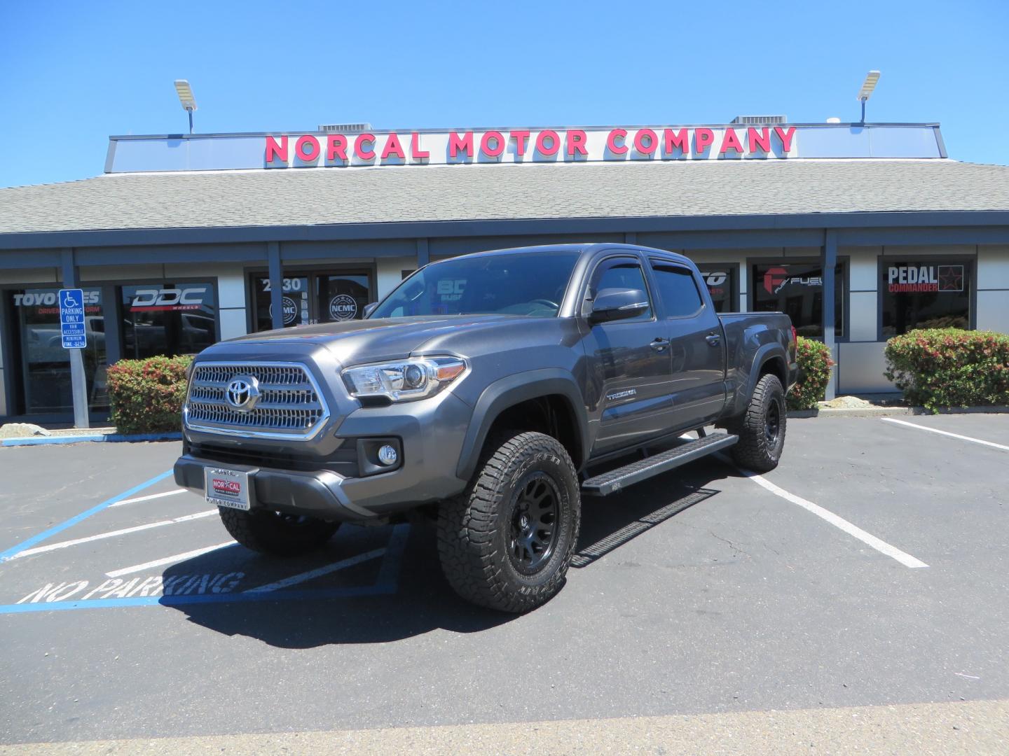 2017 CHARCOAL /GREY Toyota Tacoma TRD OFF-ROAD Double Cab Long Bed V6 6AT 4WD (3TMDZ5BN3HM) with an 3.5L V6 engine, automatic transmission, located at 2630 Grass Valley Highway, Auburn, CA, 95603, (530) 508-5100, 38.937893, -121.095482 - TRD Off-road Tacoma with a level kit, 17" Fuel Vector wheels, Falken Wildpeak AT tires, N-Fab running boards, Roll Up tonneau cover, BedRug, and window Deflectors. - Photo#0